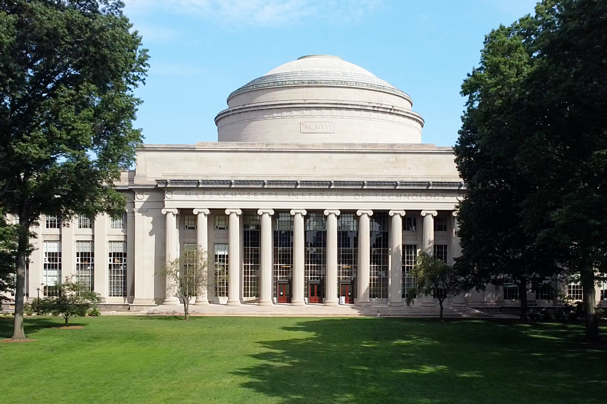 The MIT Dome in Killian Court on a sunny day.