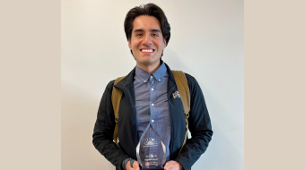 Alvaro Sahagun poses with the RISE award.